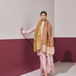 Model is wearing an Ekkat reversible stole in ochre from Shaza.