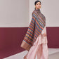 Model is wearing an Ekkat reversible stole in multicolour from Shaza.