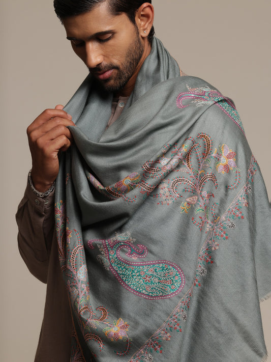Man wearing a pashmina shawl