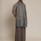 Man wearing a pashmina shawl