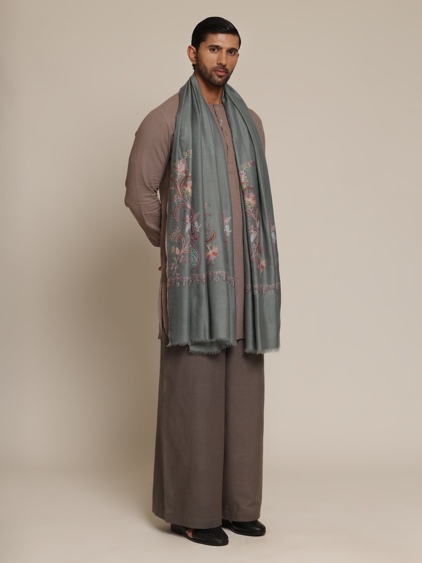 Man wearing a pashmina shawl
