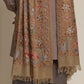 Man wearing beige pashmina shawl