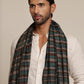 Man wearing a check stole