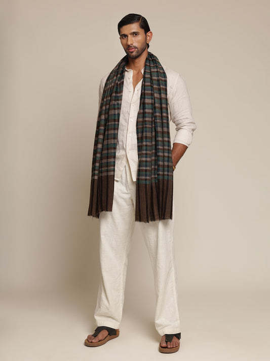 Man wearing a check stole