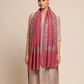 Woman wearing a pink stole