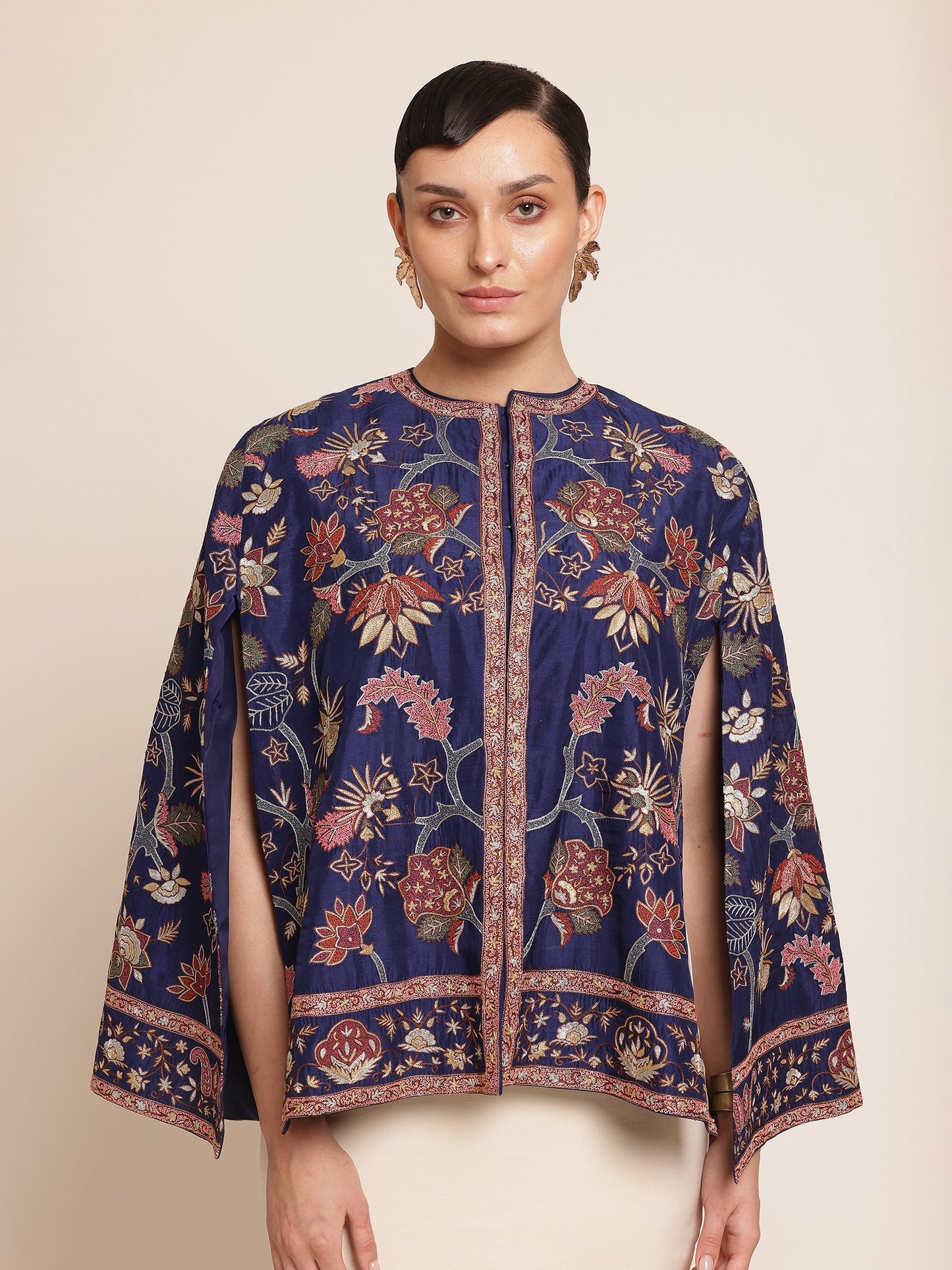 Woman wearing a floral-patterned navy blue jacket