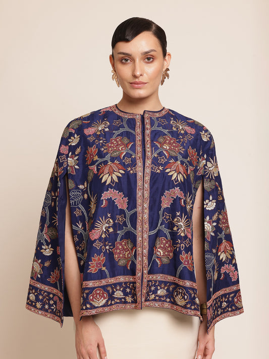 Woman wearing a floral-patterned navy blue jacket