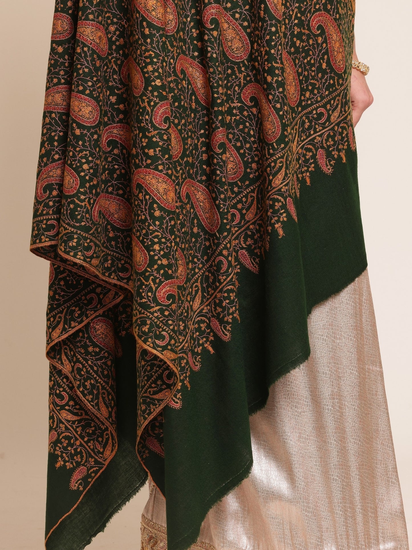 Woman wearing a green pashmina shawl