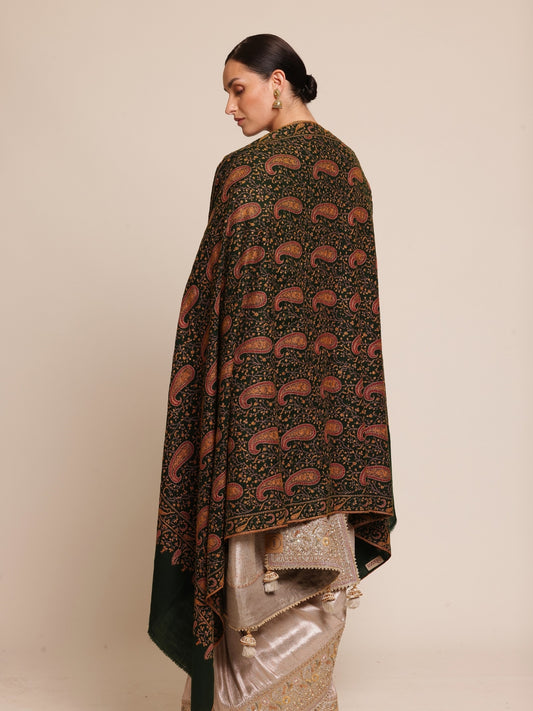 Woman wearing a green pashmina shawl