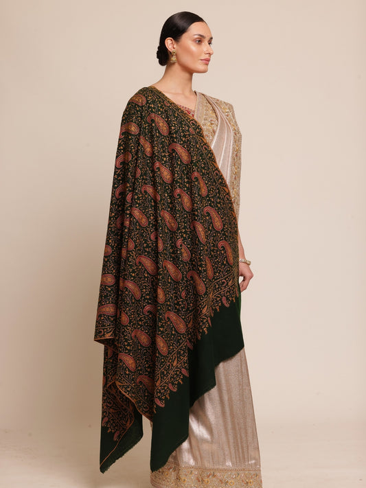 Woman wearing a green pashmina shawl