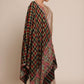 Woman wearing a heritage pashmina shawl