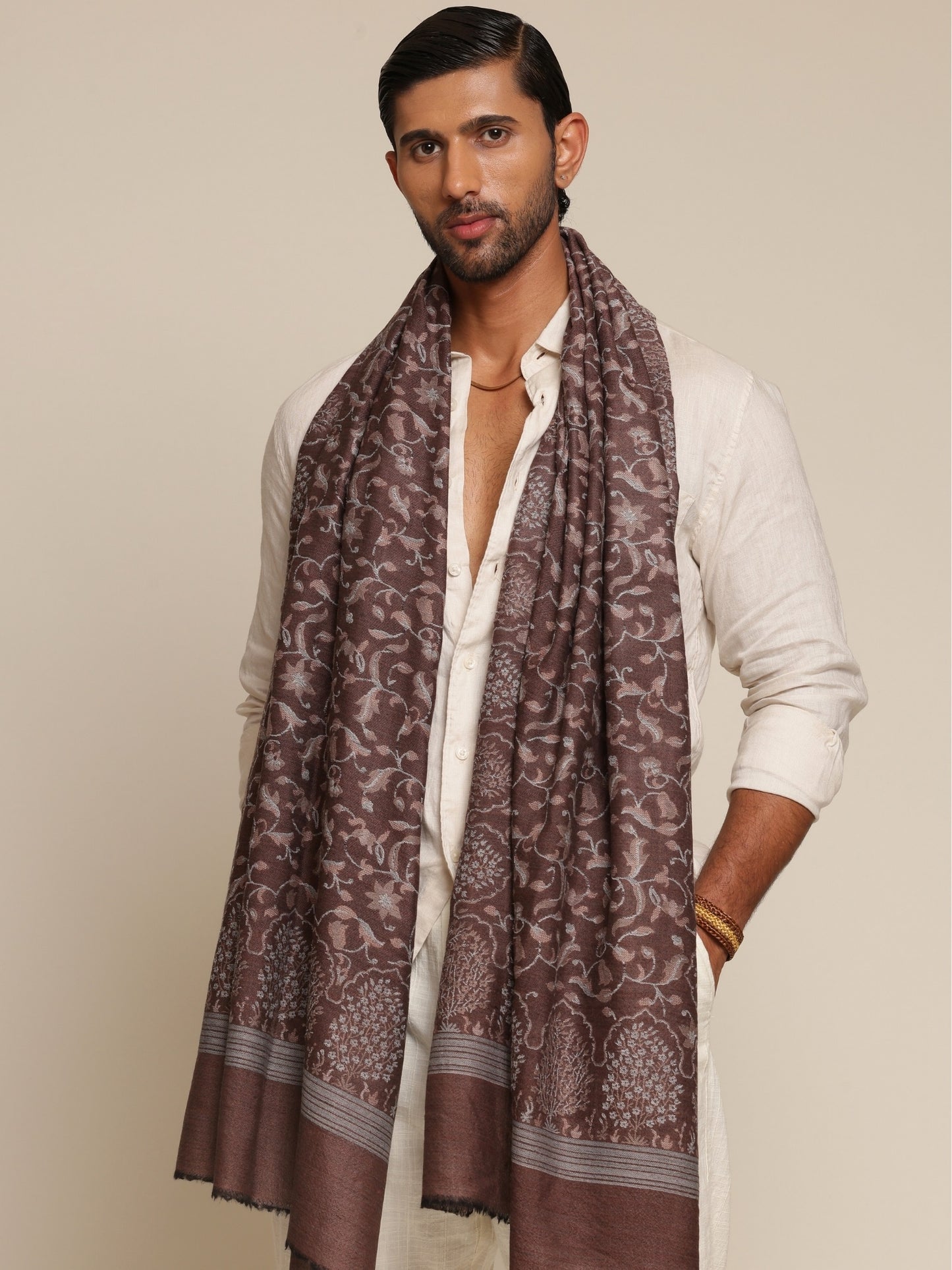 Man wearing a patterned stole