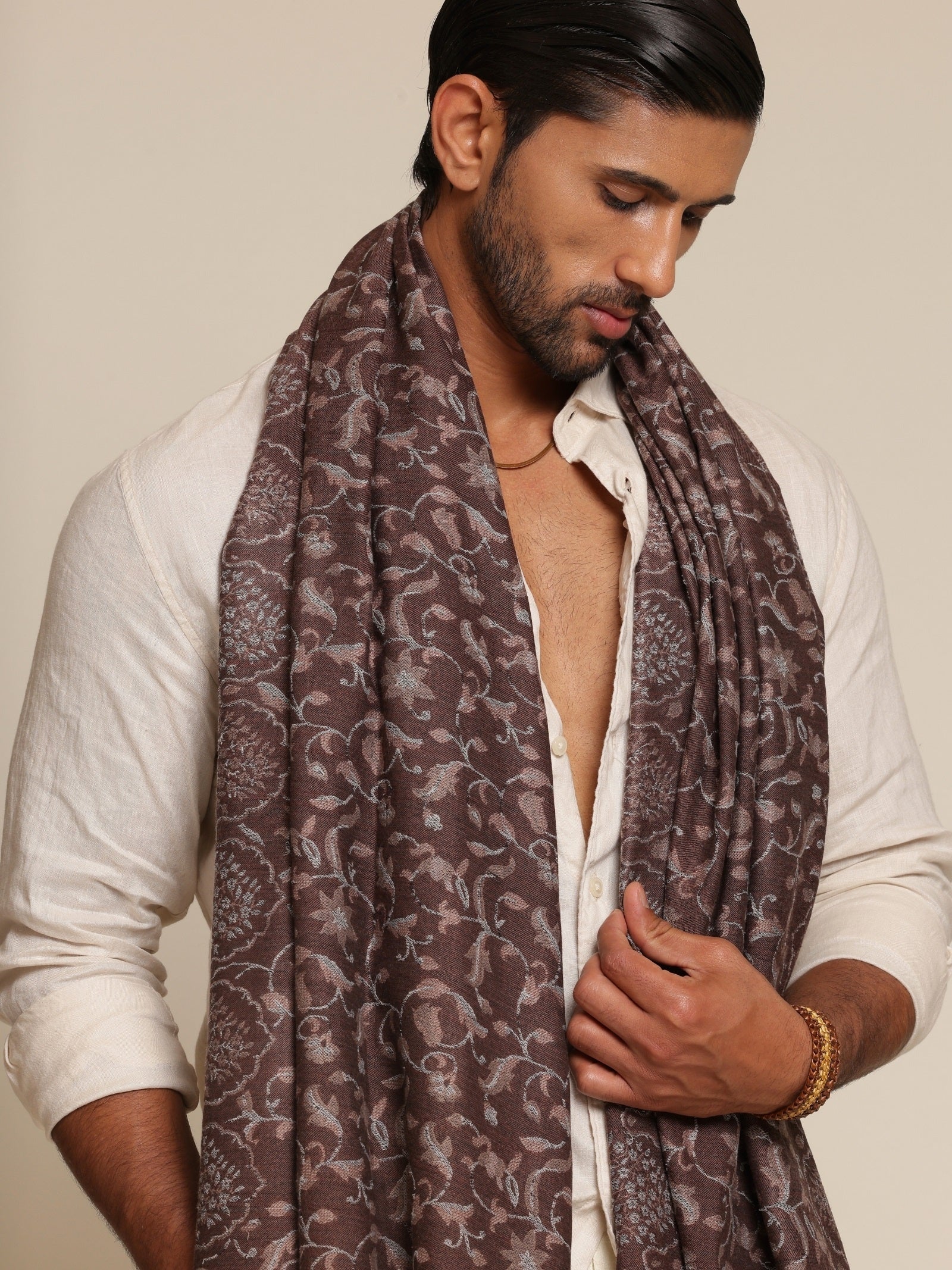 Man wearing a patterned stole