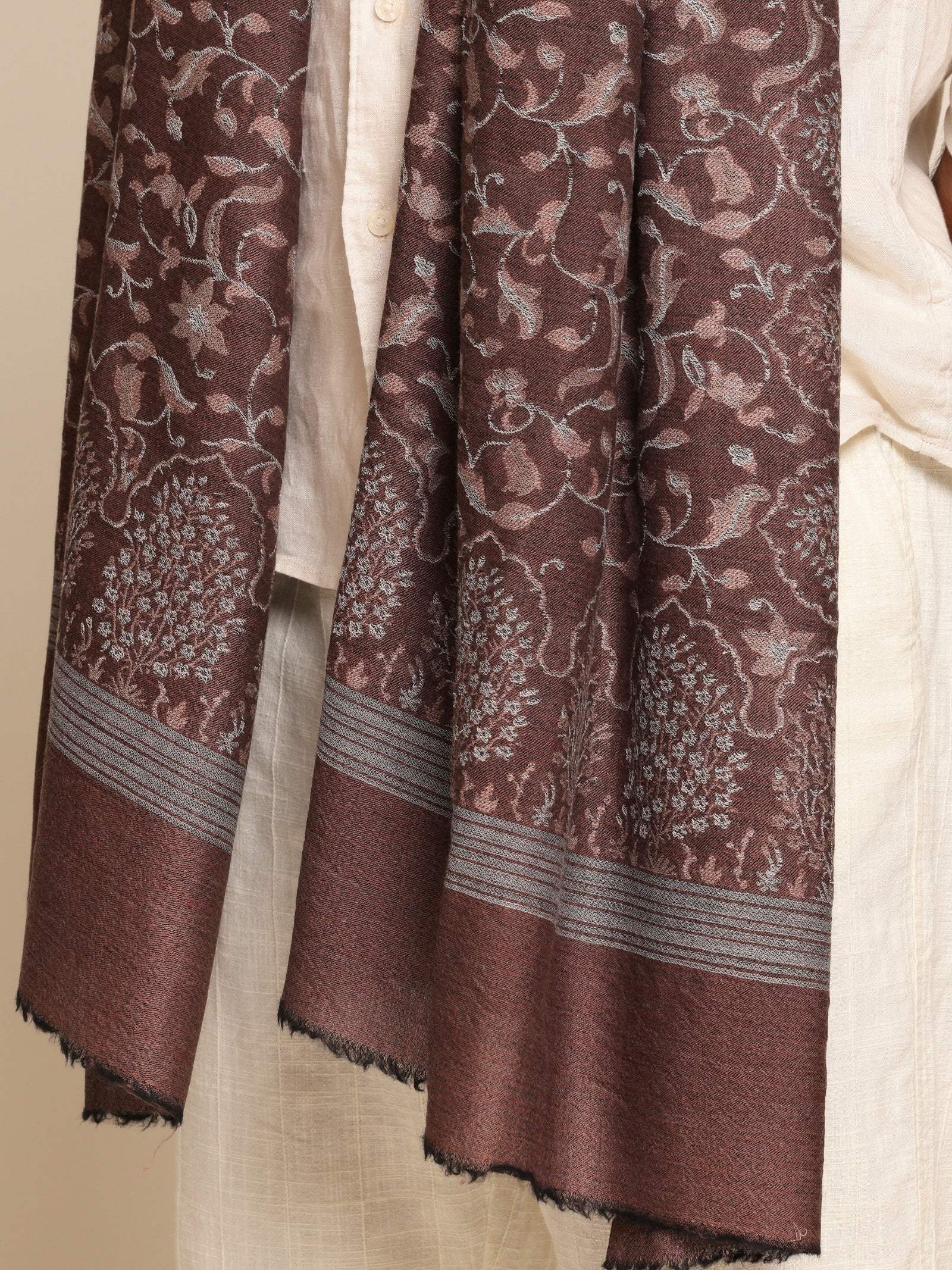 Man wearing a patterned stole