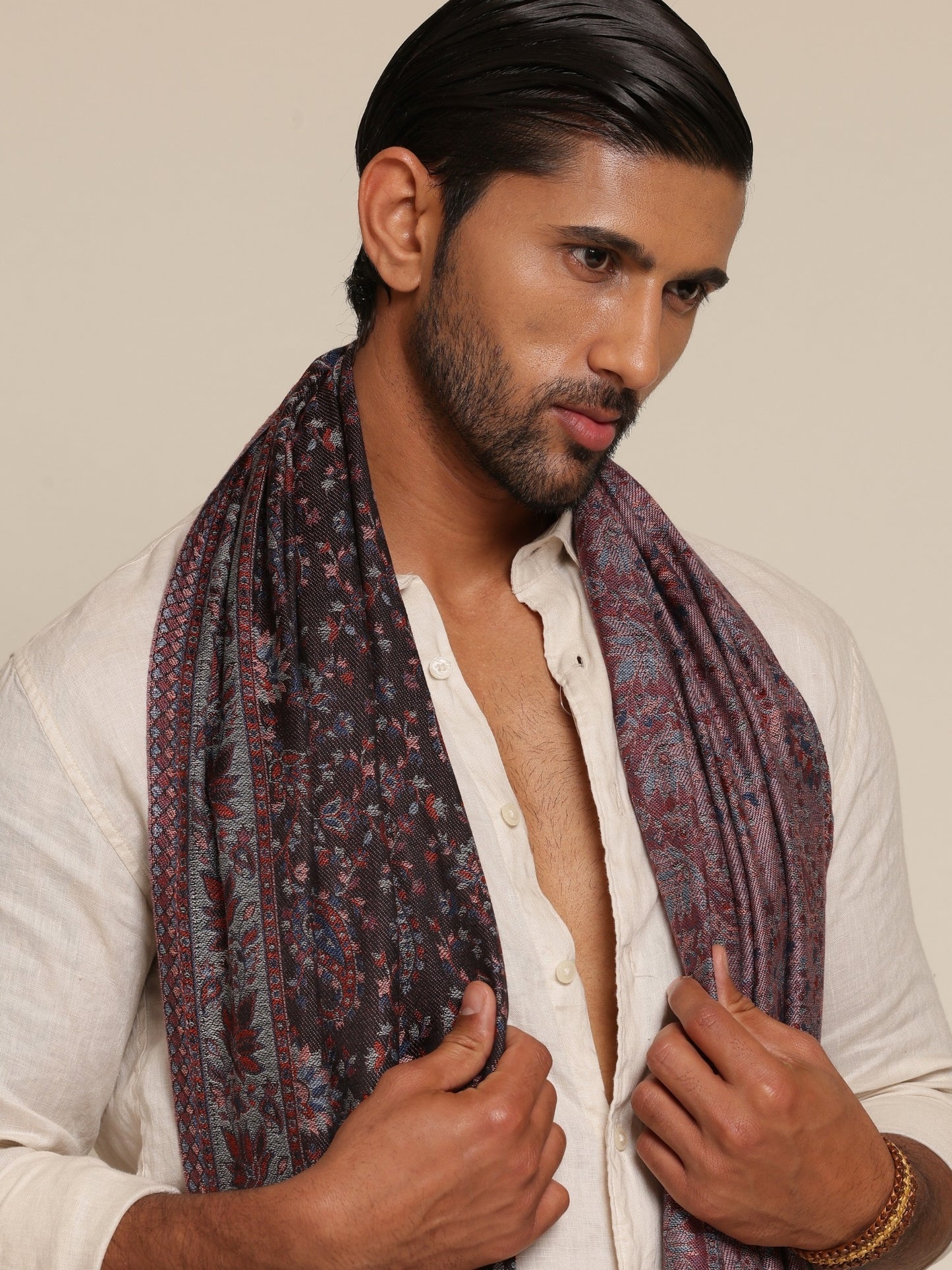 Man wearing a kani woolen stole