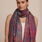 Woman wearing a kani patterned stole