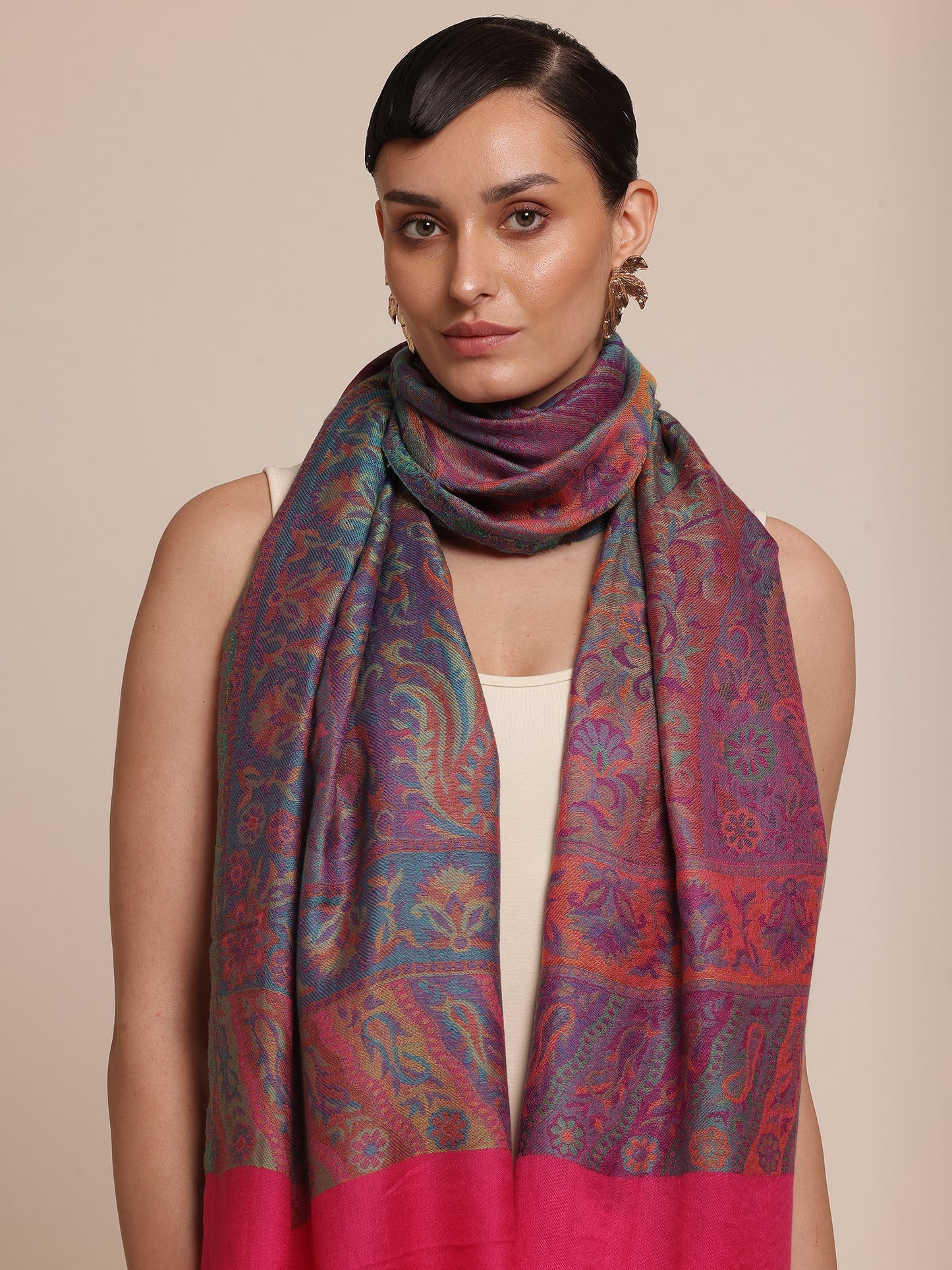 Woman wearing a kani patterned stole