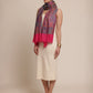 Woman wearing a kani patterned stole