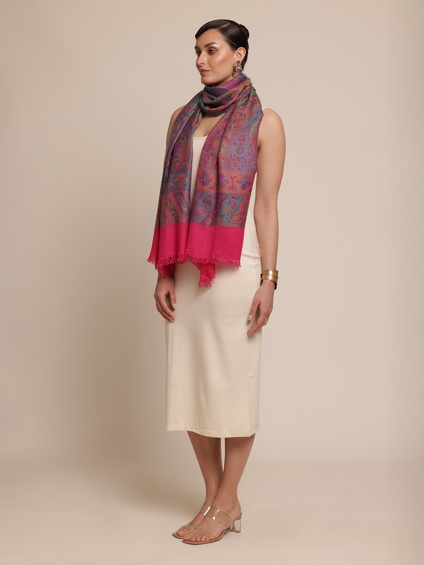 Woman wearing a kani patterned stole