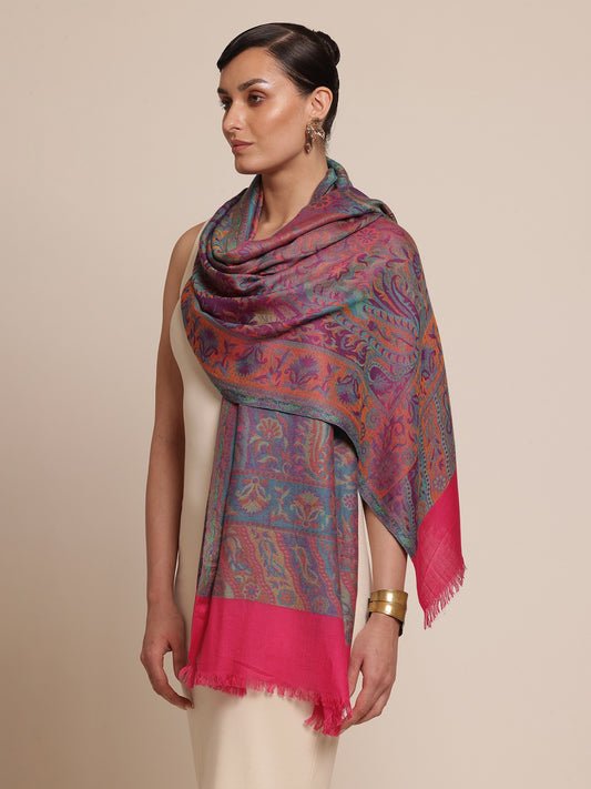 Woman wearing a kani patterned stole