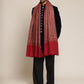 Man wearing a red patterned kalamkari shawl