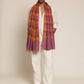 Man wearing a check shawl