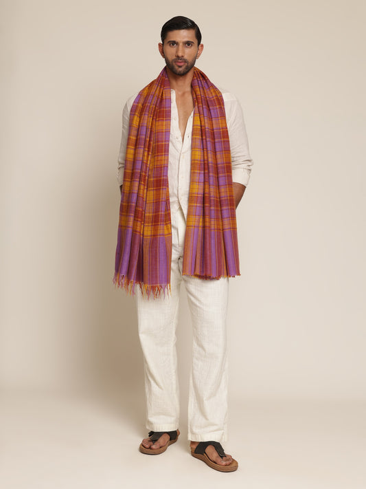 Man wearing a check shawl