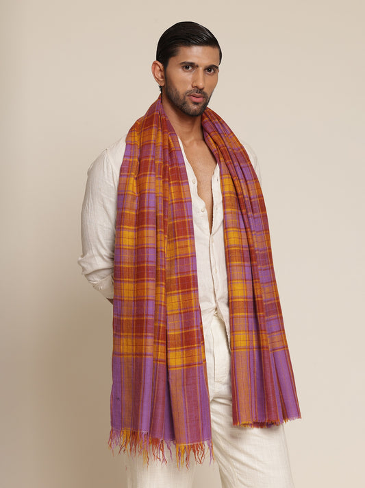 Man wearing a check shawl