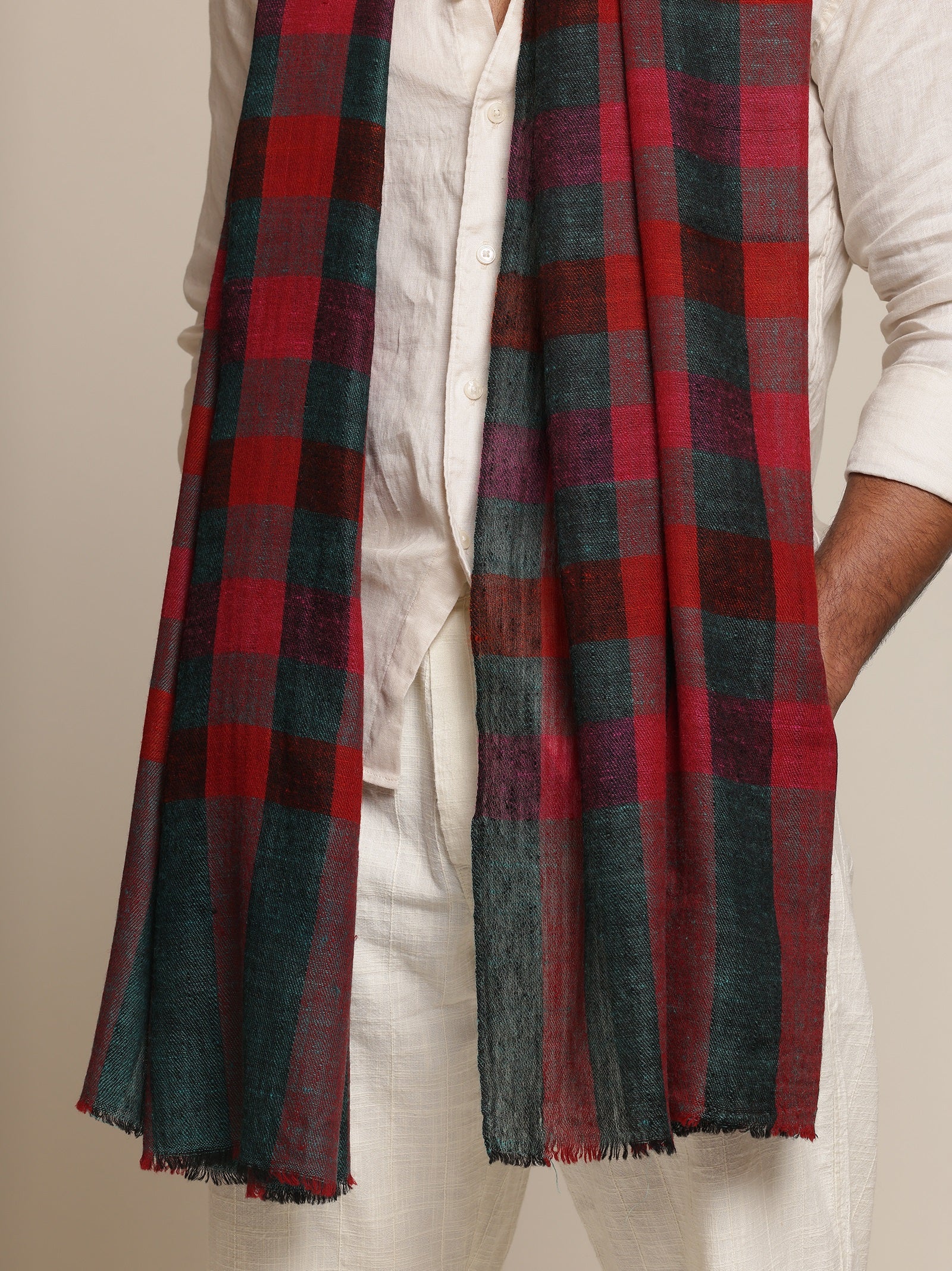 Man wearing a red pashmina check stole