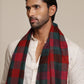 Man wearing a red pashmina check stole