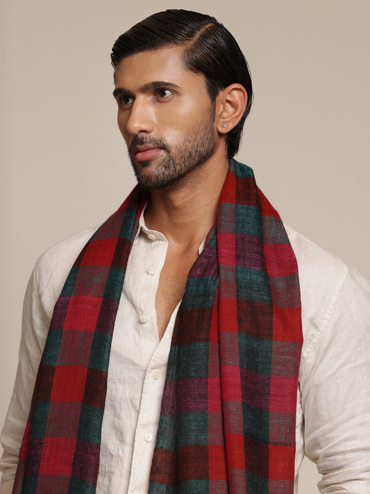 Man wearing a red pashmina check stole
