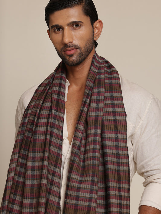 Man wearing a check stole