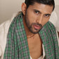 Man wearing a green pashmina stole
