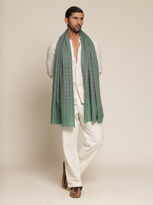 Man wearing a green pashmina stole