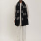 Man wearing a black pashmina shawl
