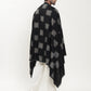 Man wearing a black pashmina shawl