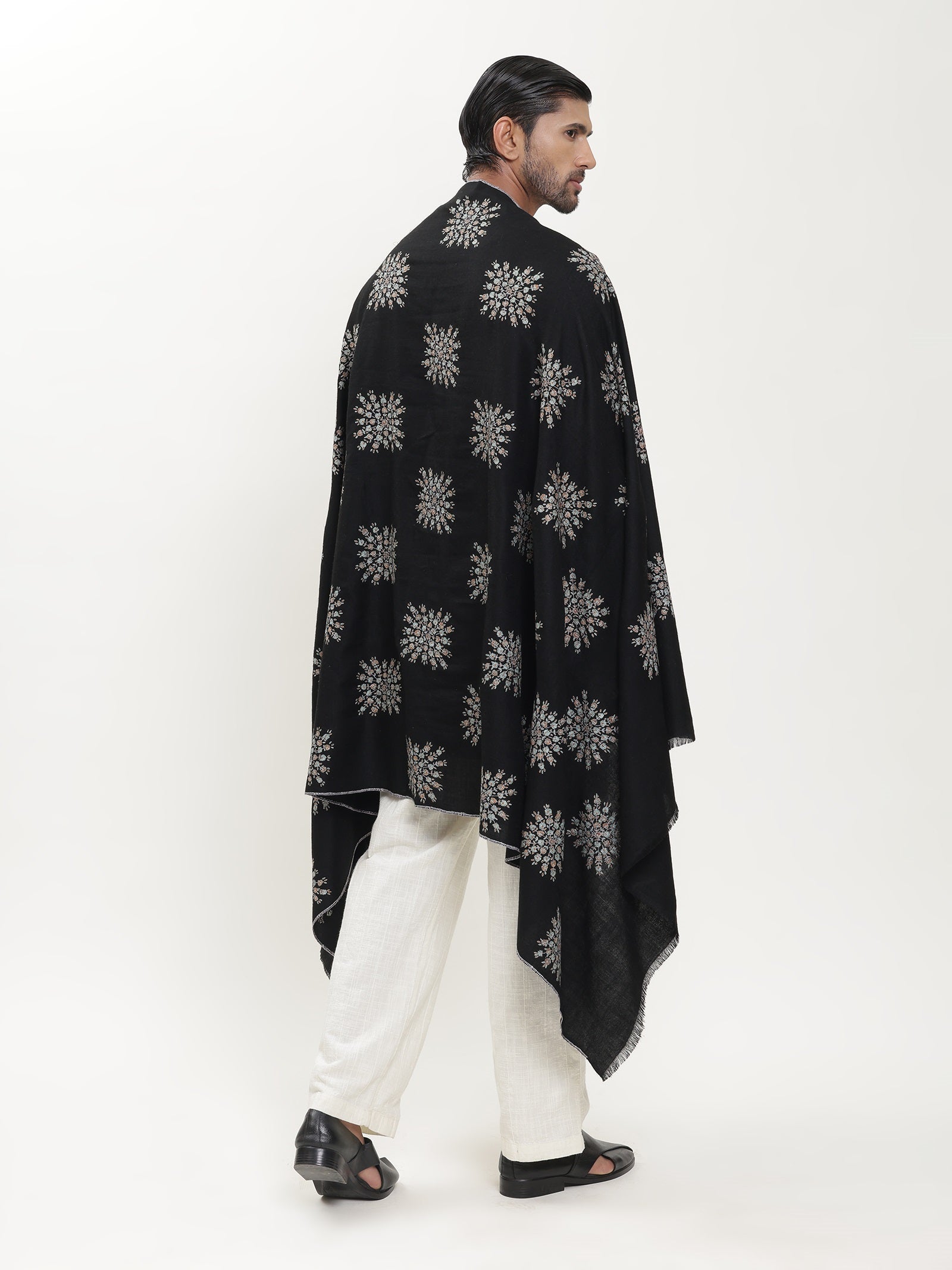 Man wearing a black pashmina shawl