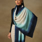 Model is wearing a Saya Ombre stole from Shaza, in the colour ocean : White, sea green and prussian blue. 