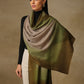 Model is wearing a Saya Ombre stole from Shaza, in the colour Canopy: Toosh, green and brown.