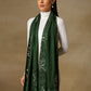 Model is wearing a Vineyard stole in the colour forest green, featuring vine shaped cutwork and zari detailing. 