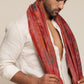 Man wearing a red stole