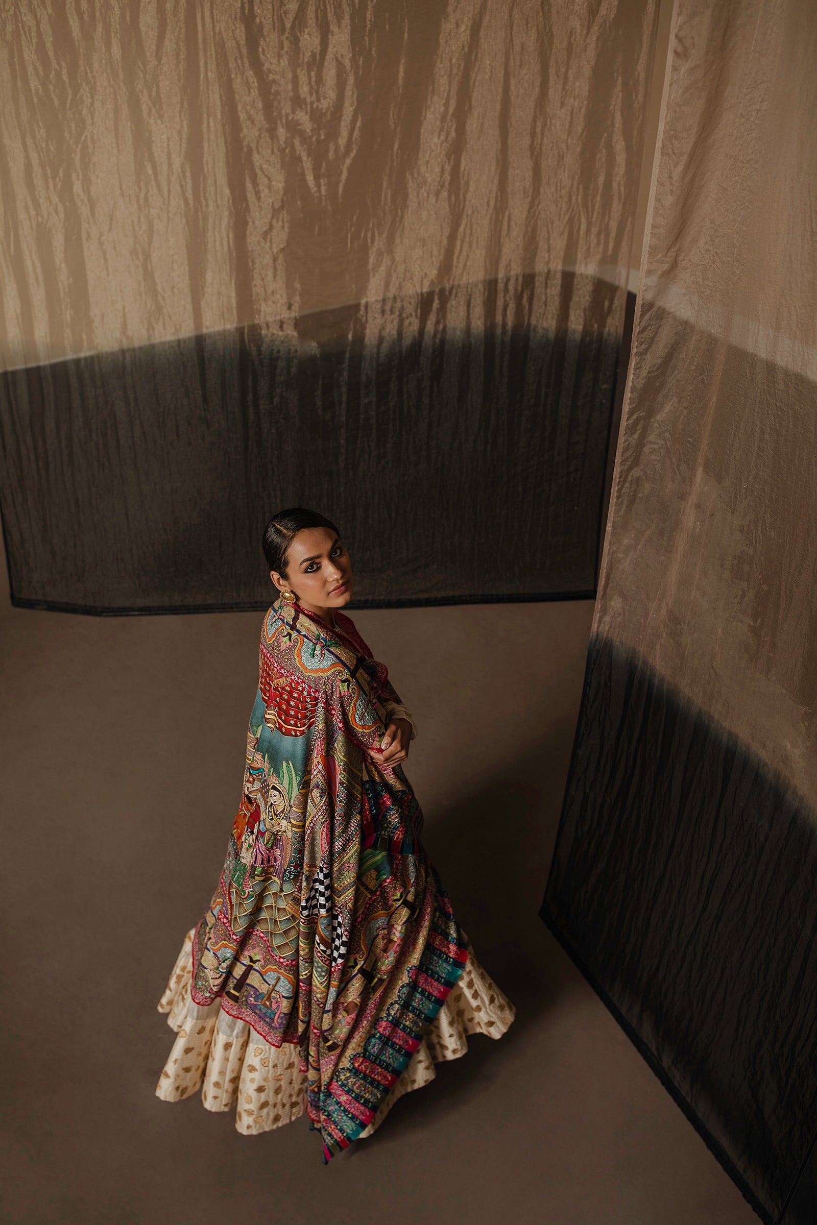 Model is wearing the Henna pashmina shawl from Shaza.