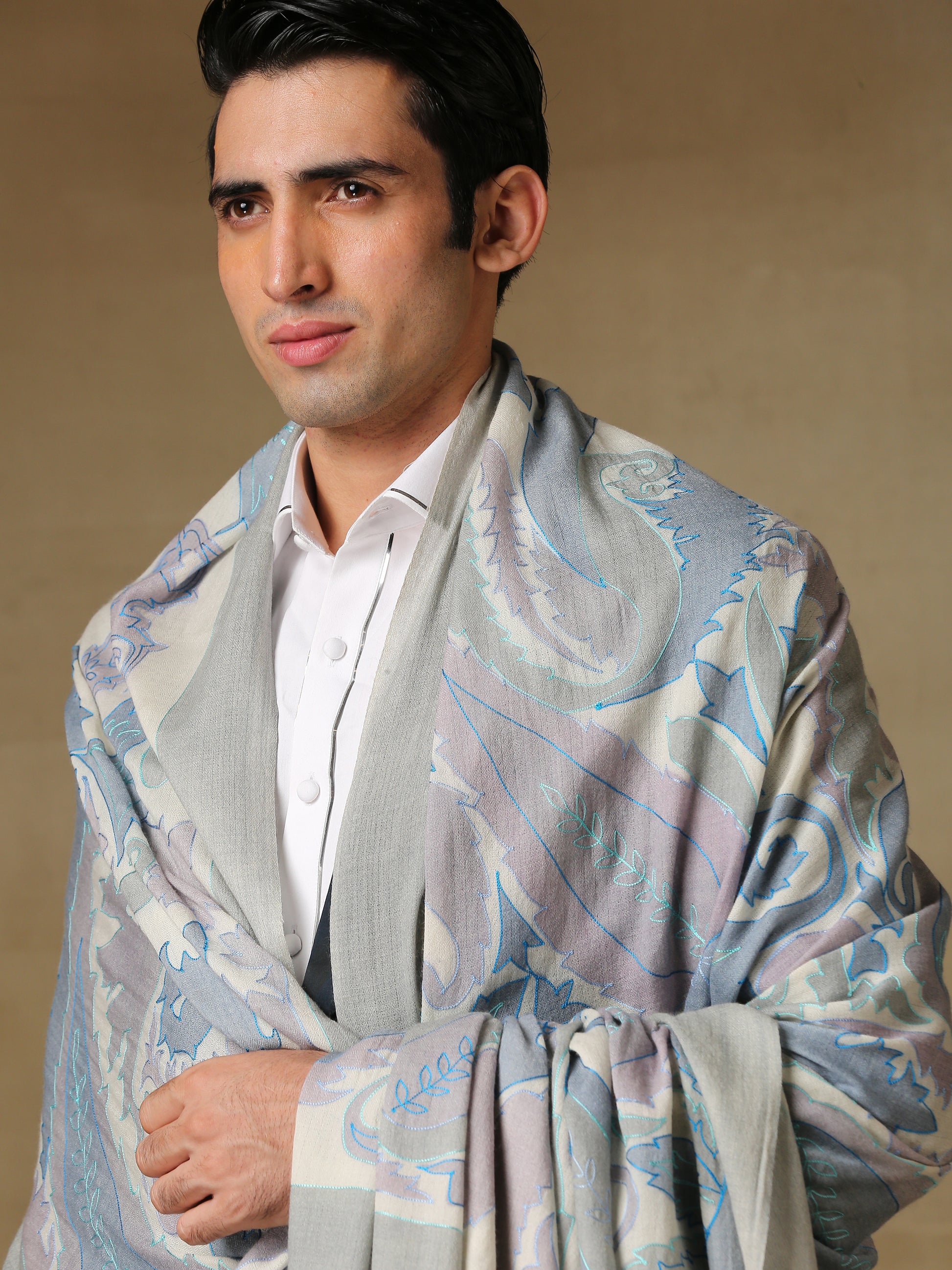 Model is wearing the Men's Kalamkari Khaka Dushala from Shaza. 
