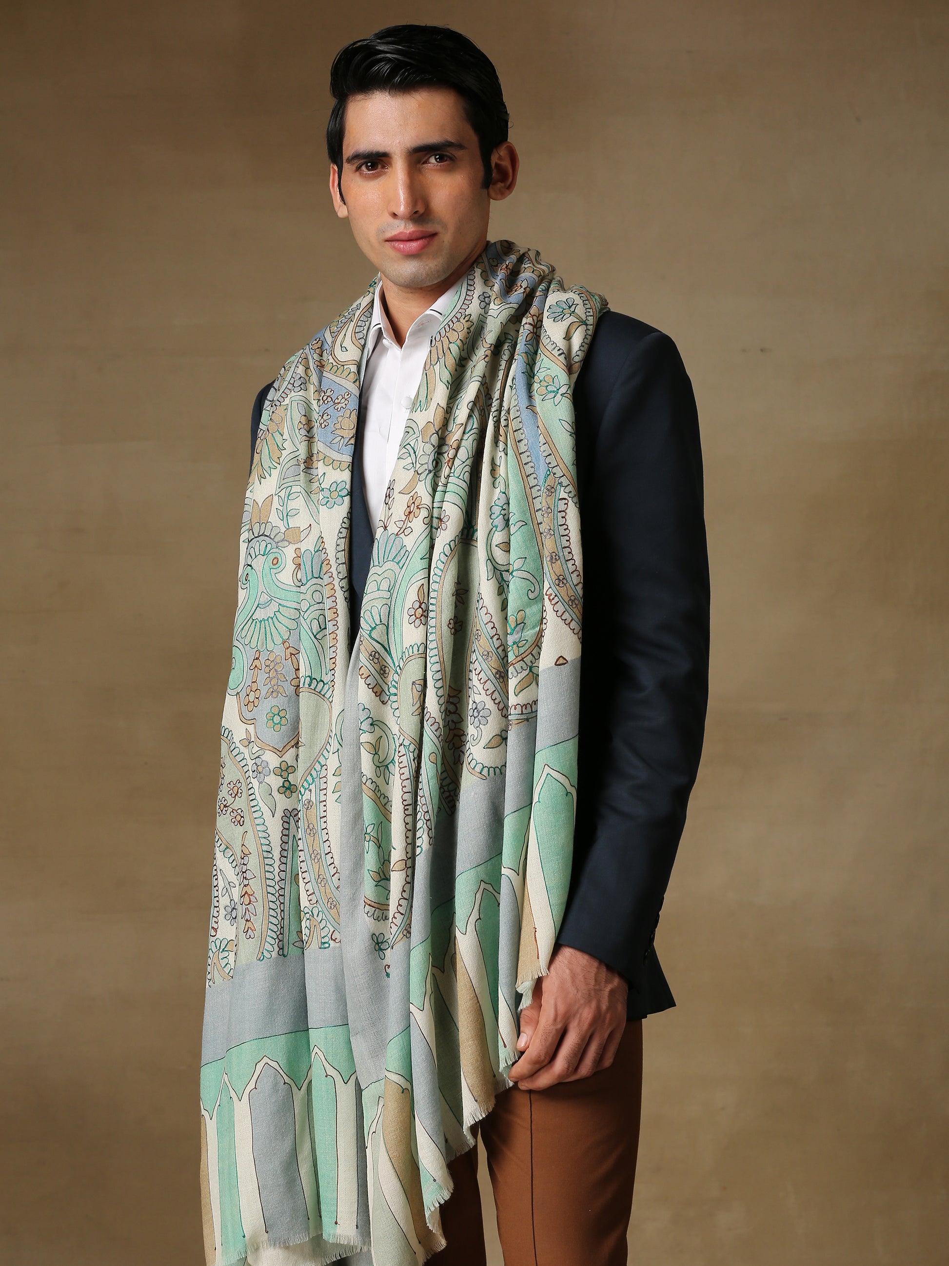 Model is wearing the Men's Kalamkari Khaka Dushala from Shaza. 