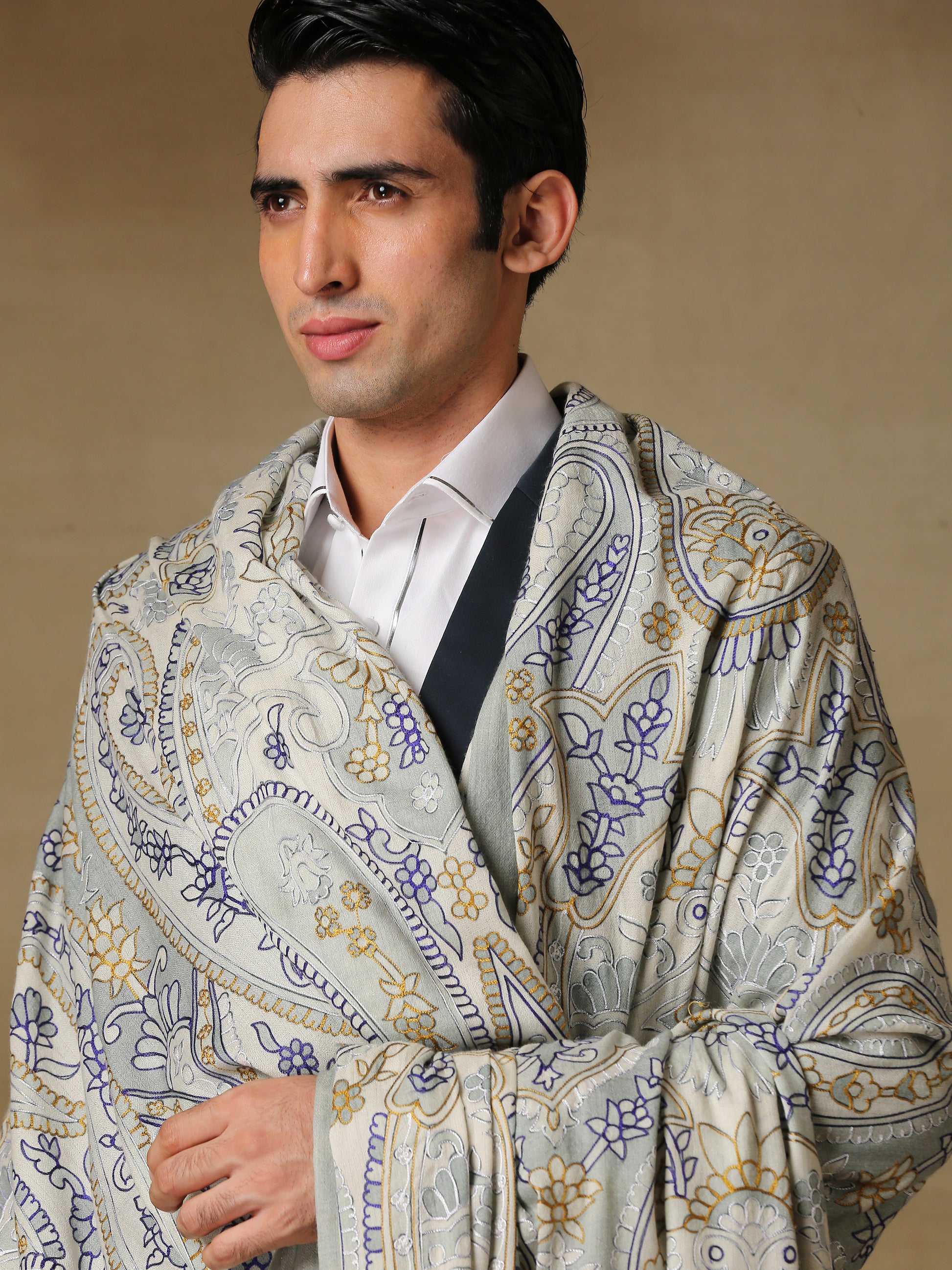 Model is wearing the Men's Kalamkari Khaka Dushala from Shaza. 