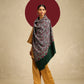 Model is wearing a Needlework pashmina shawl from shaza in a green colour.