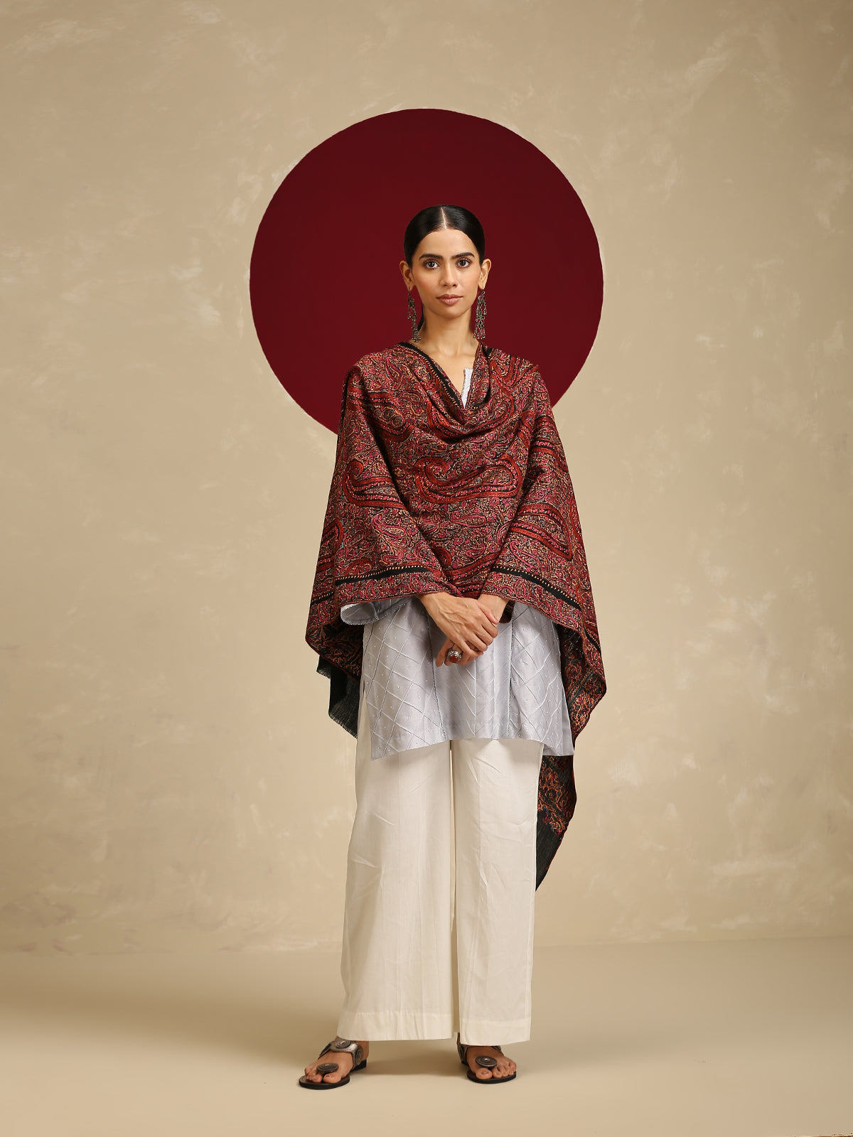 Model is wearing a thread embroidery jaama stole in a black colour with delicate threadwork needle embroidery all over.