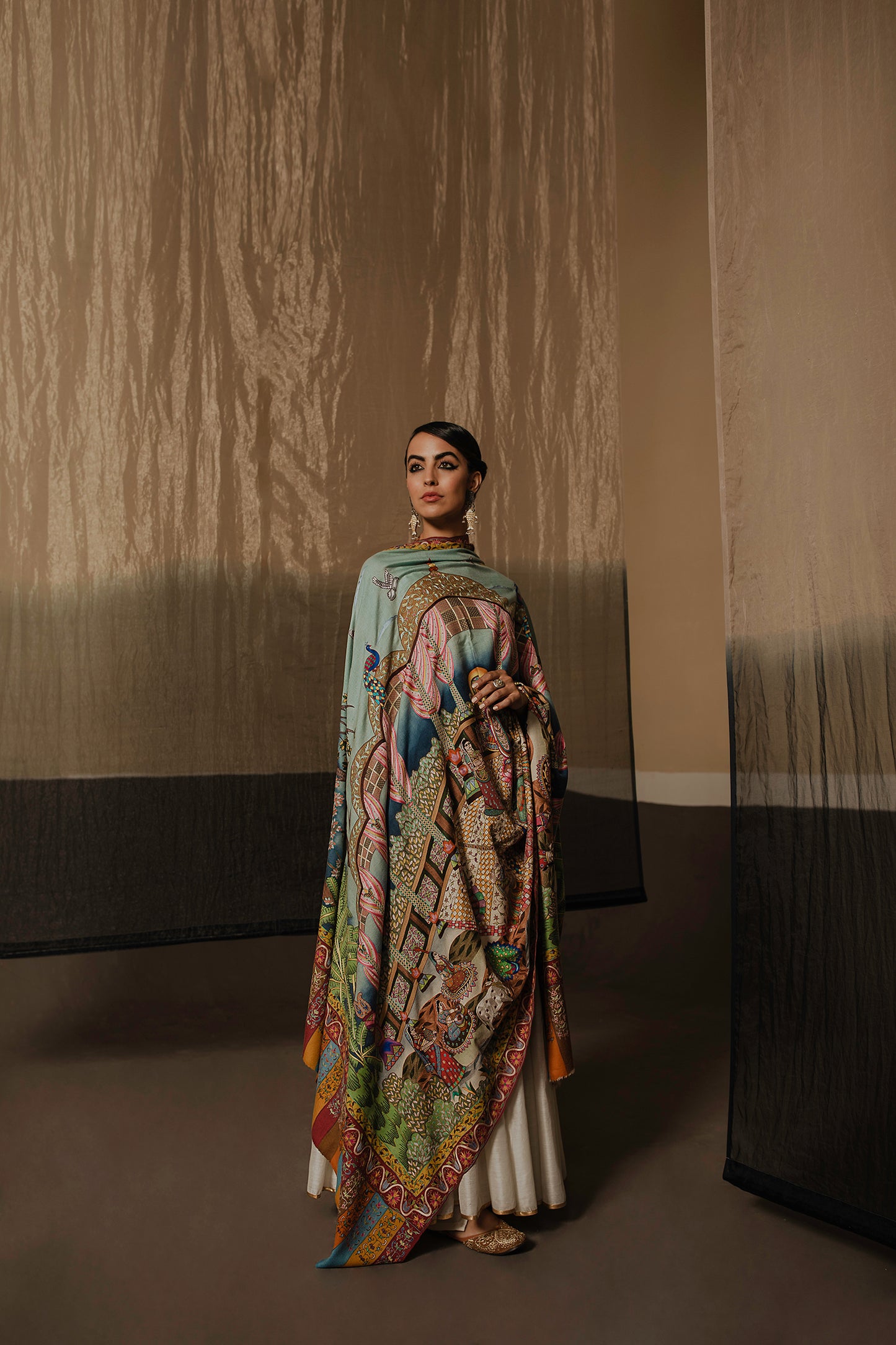 Model is wearing the Shree Nath ji Pashmina shawl from Shaza.