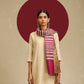 Model is wearing Ekkat reversible stole in a pink with gold zari backing. 