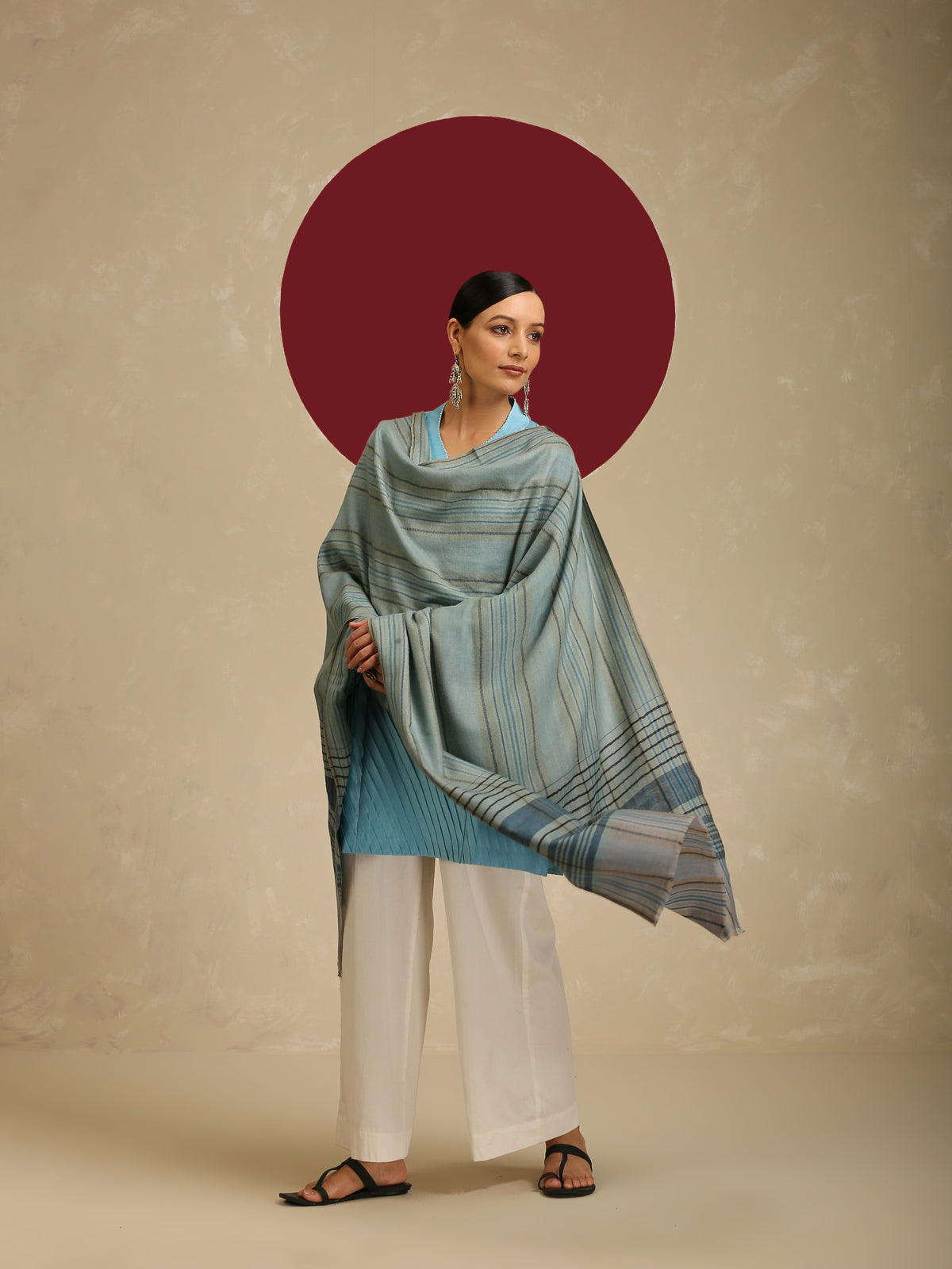 Model is wearing Pashmina check stole in ice blue and indigo.